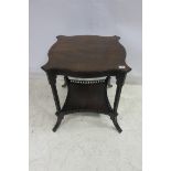 A 19TH CENTURY MAHOGANY OCCASIONAL TABLE of serpentine outline the shaped top raised on ring turned