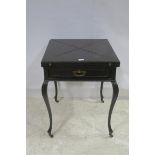 A 19TH CENTURY MAHOGANY ENVELOPE CARD TABLE the square top with hinged leaves containing a baize