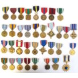 Collection of United States Service and Achievement Awards to Army, Navy, Air Force and Coast Guard.