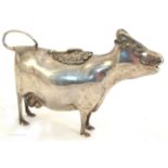A silver cow creamer, by Richard Comyns, in the Georgian style,