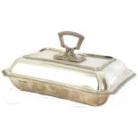 George V silver entree dish and cover, the rectangular dish with canted corners and gadrooned rim.