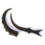 A Maasai East-African crescent-shaped dagger in antelope horn scabbard.