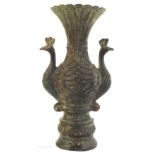 A Chinese bronxe double peacock vase,