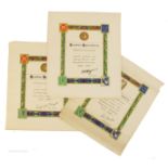 A collection of five 1939-1946 Emergency Service certificates and a Good Conduct Medal certificate,