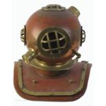 A full-size model of a diving helmet. A copper and brass model, 20" (60cm) high.