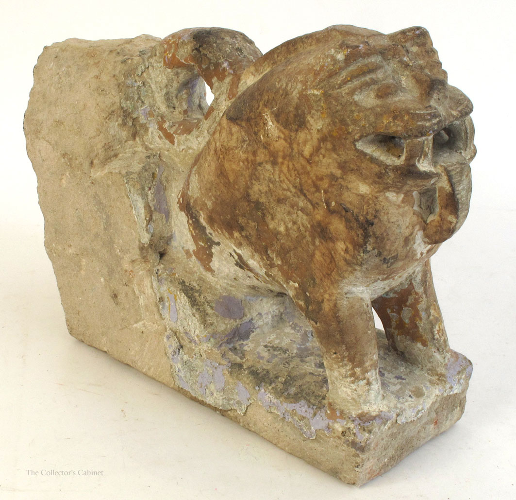 Indian carved sandstone lion, an architectural decorative stone carved in the form of a lion.