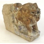 Indian carved sandstone lion, an architectural decorative stone carved in the form of a lion.