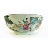 A Chinese famille rose porcelain punch bowl, enamelled to the interior with chrysanthemum,