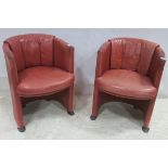 A PAIR OF ROLF BENZ WINE HIDE UPHOLSTERED TUB SHAPED CHAIRS each with a linen fold back