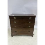 A GEORGIAN MAHOGANY CHEST of four long graduated drawers on bracket feet 94cm (h) x 99cm (w) x 53cm