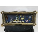 A COLLECTION OF FRAMED SHIPPING MEMORABILIA containing a steam ship anchor life buoy etc in pie and