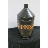 A METAL AND POLYCHROME CONTAINER of baluster form inscribed Guinness 55cm (h)