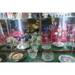 A COLLECTION OF RUBY GLASS to include decanters vase epergne