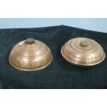 TWO RETRO COPPER HOT WATER BOTTLES each of circular bulbous form