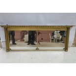 A FINE REGENCY GILTWOOD AND GESSO COMPARTMENTED OVER MANTEL MIRROR the rectangular plates between