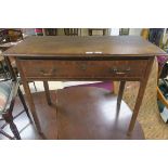 A 19th CENTURY OAK CROSSBANDED TABLE the rectangular top with moulded rim above a single frieze