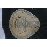 A COLDCAST WALL PLAQUE inscribed The 1916 Easter Rising GPO Dublin of circular tapering form 32cm x