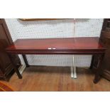 AN ORIENTAL ROSEWOOD SIDE TABLE of rectangular outline with shaped frieze on square moulded legs