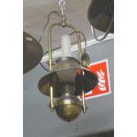A PAIR OF BRASS AND FROSTED GLASS CENTRE LIGHTS in the form of oil lamps