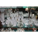 A COLLECTION OF GLASS to include Waterford cut glass drinking glasses a cut glass bowl tankard etc