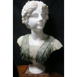 A POLYCHROME MARBLE BUST OF NIKE goddess of victory 69cm (h)