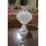 A WATERFORD CUT GLASS TABLE LAMP of bulbous form on circular base 36cm (h)