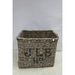 A LARGE WICKER WORK BASKET monogrammed JLB 730 77cm (h) x 100cm (w) x 80cm (d)