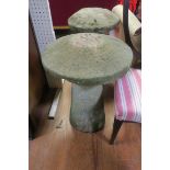 TWO SANDSTONE GARDEN ORNAMENTS each in the form of a mushroom raised on a cylindrical spreading