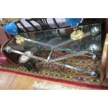 AN ITALIAN CHROME AND GLAZED DESIGNER CONSOLE TABLE the rectangular glazed top raised on X shaped