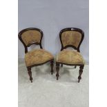 A SET OF SIX VICTORIAN DESIGN DINING CHAIRS each with a curved back with upholstered panel and seat
