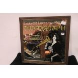 A FRAMED ADVERTISING MIRROR inscribed Phonograph Thomas A Edison 69cm x 69cm