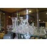 A COLLECTION OF GLASS WARE to include a Waterford cut glass decanter mantel clock and various other