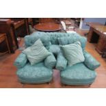 A THREE PIECE VICTORIAN CHESTERFIELD SUITE comprising two seater settee with deep buttoned