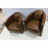 A VERY FINE PAIR OF CHERRYWOOD AND HIDE UPHOLSTERED AVIATION TUB SHAPED CHAIRS each with panelled