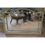 A CONTINENTAL GILT FRAMED COMPARTMENTED OVERMANTEL MIRROR of rectangular arched outline beadwork