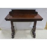 A 19TH CENTURY MAHOGANY FALL AND RISE DUMB WAITER of rectangular outline with moulded back on