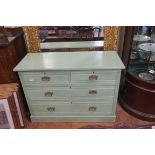 AN EDWARDIAN PAINTED CHEST of rectangular outline with two short and two long drawers with brass