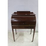 A GOOD 19TH CENTURY MAHOGANY CYLINDER FRONT DESK with satinwood string inlay the rectangular top