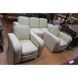 A THREE PIECE VINTAGE SUITE comprising a three seater settee and a pair of side chairs each with a