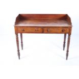 A VICTORIAN MAHOGANY SIDE TABLE of rectangular outline the shaped top with moulded three quarter