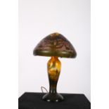 A GALEA DESIGN ETCHED GLASS TABLE LAMP with mushroom shaped shade above a baluster column on