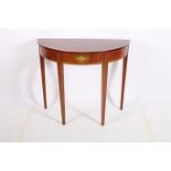 A SHERATON DESIGN MAHOGANY AND SATINWOOD INLAID SIDE TABLE of demilune outline the shaped top with