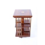 A SHERATON DESIGN MAHOGANY AND SATINWOOD INLAID REVOLVING BOOK STAND the square moulded top above