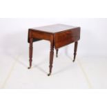 A REGENCY MAHOGANY DROP LEAF TABLE the rectangular hinged top with frieze drawer on lobed and ring