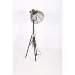 A RETRO METAL AND POLYCHROME ADJUSTABLE FLOOR STANDARD LAMP on tripod support with mesh shade 125cm