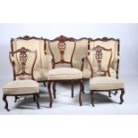 A 19TH CENTURY SIX PIECE DRAWING ROOM SUITE comprising a two seater wing back settee a lady's and