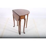 A QUEEN ANNE DESIGN MAHOGANY DROP LEAF TABLE the oval hinged top raised on cabriole legs with pad