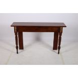 A 19TH CENTURY MAHOGANY AND GILT BRASS MOUNTED SIDE TABLE of rectangular outline the shaped top