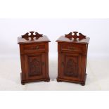 A PAIR OF MAHOGANY PEDESTALS each of rectangular form with frieze drawer above a carved panelled