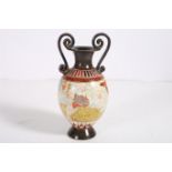 A 20TH CENTURY CERAMIC JUG with flared rim and leaf pattern scroll handles with leaf decoration